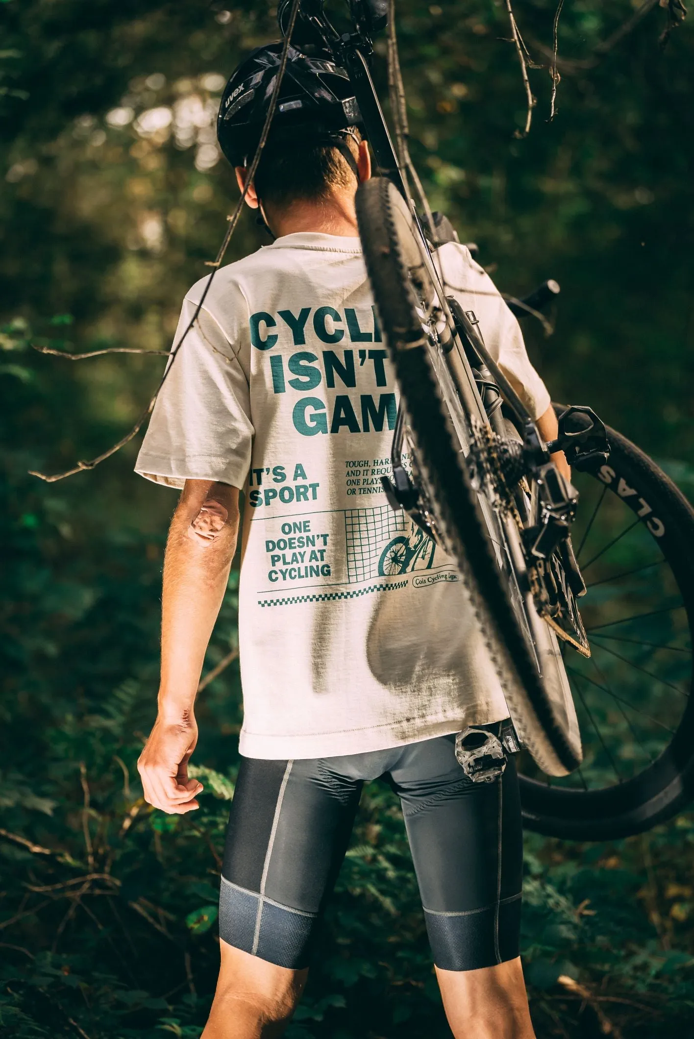 Cycling isn't a game oversized unisex cycling T-shirt (natural - green)